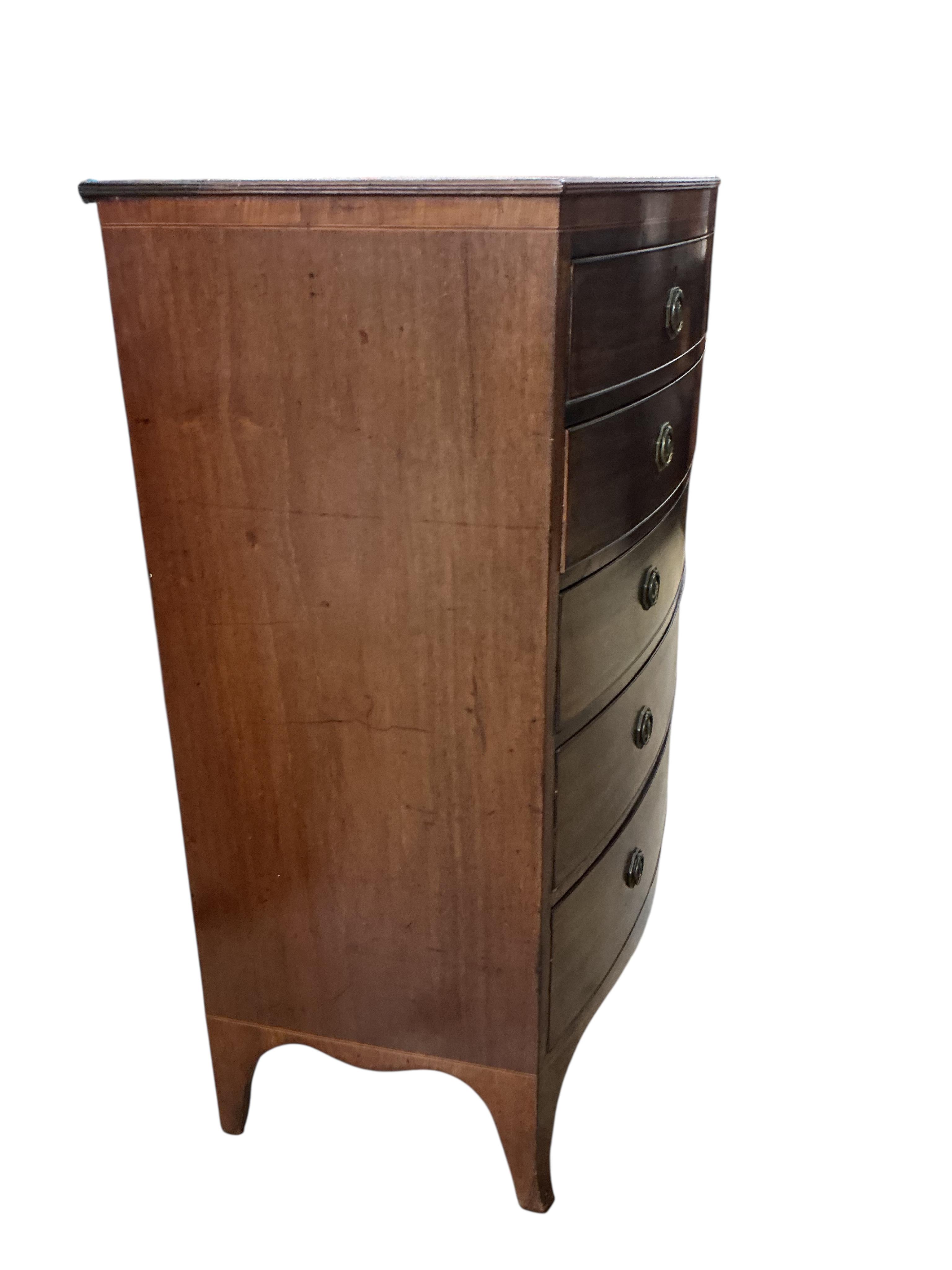 A Regency mahogany bow fronted chest, fitted two short and four long graduated drawers, width 106cm, depth 56cm, height 122cm